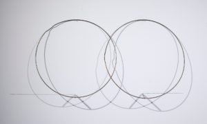 Felipe Dulzaides, Split Ends, 2011. Graphite, two metals rings, nail and pencil.