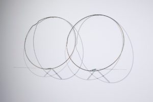 Felipe Dulzaides, Split Ends, 2011. Graphite, two metals rings, nail and pencil.